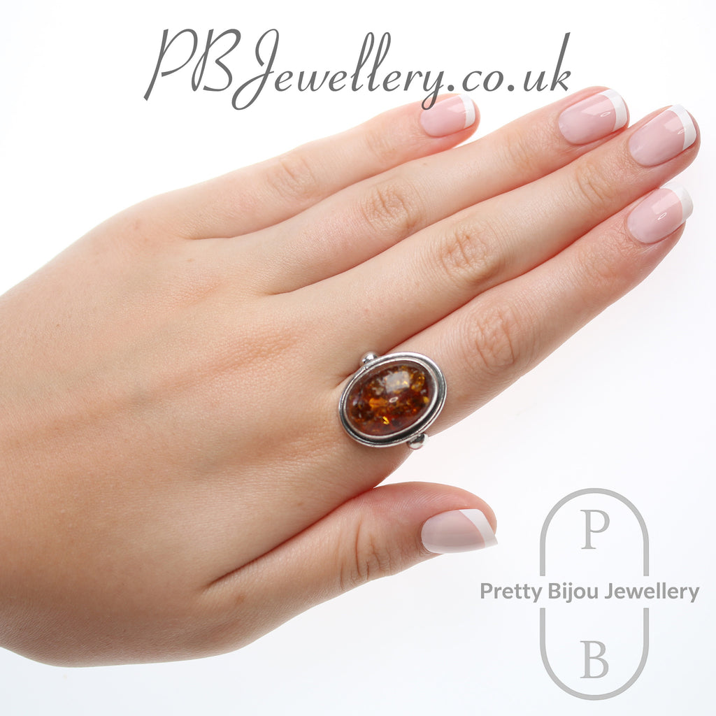 Large oval amber sterling silver ring – view 4