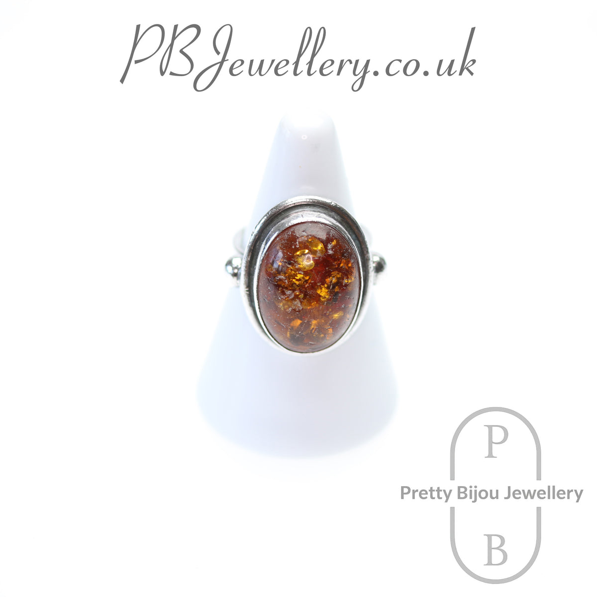 Large oval amber sterling silver ring – view 1