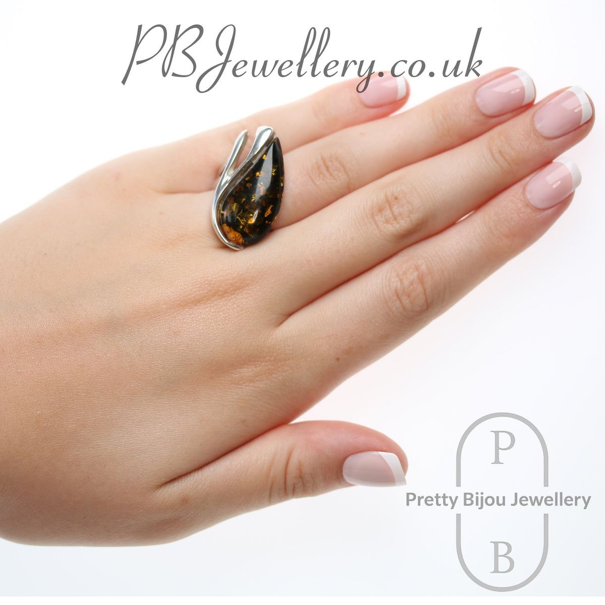 Teardrop amber sterling silver ring with flower setting, size Q – view 4