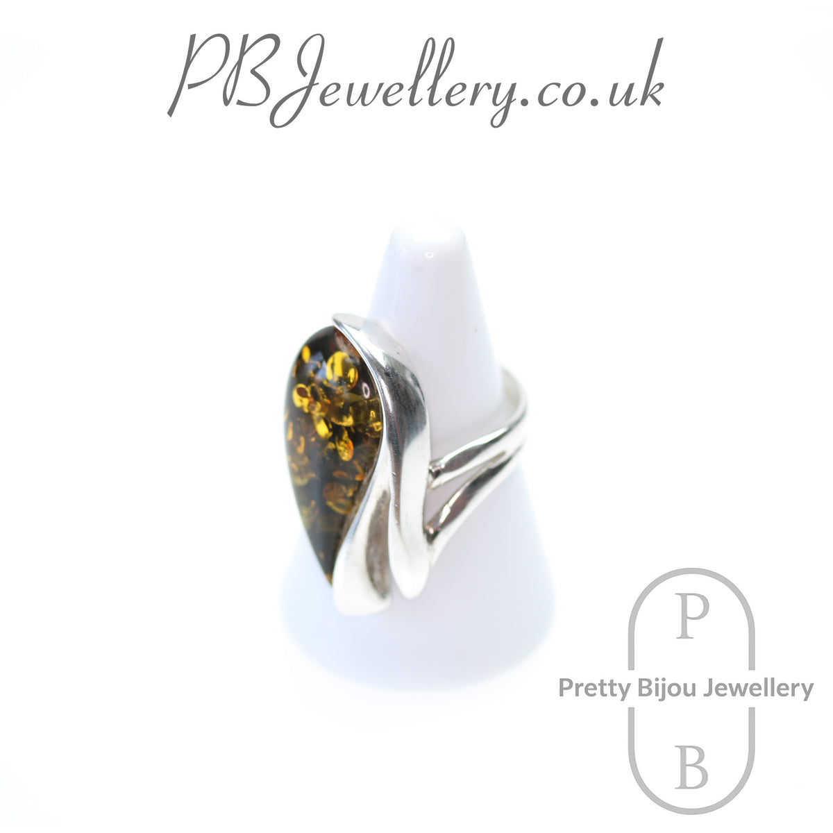 Teardrop amber sterling silver ring with flower setting, size Q – view 2