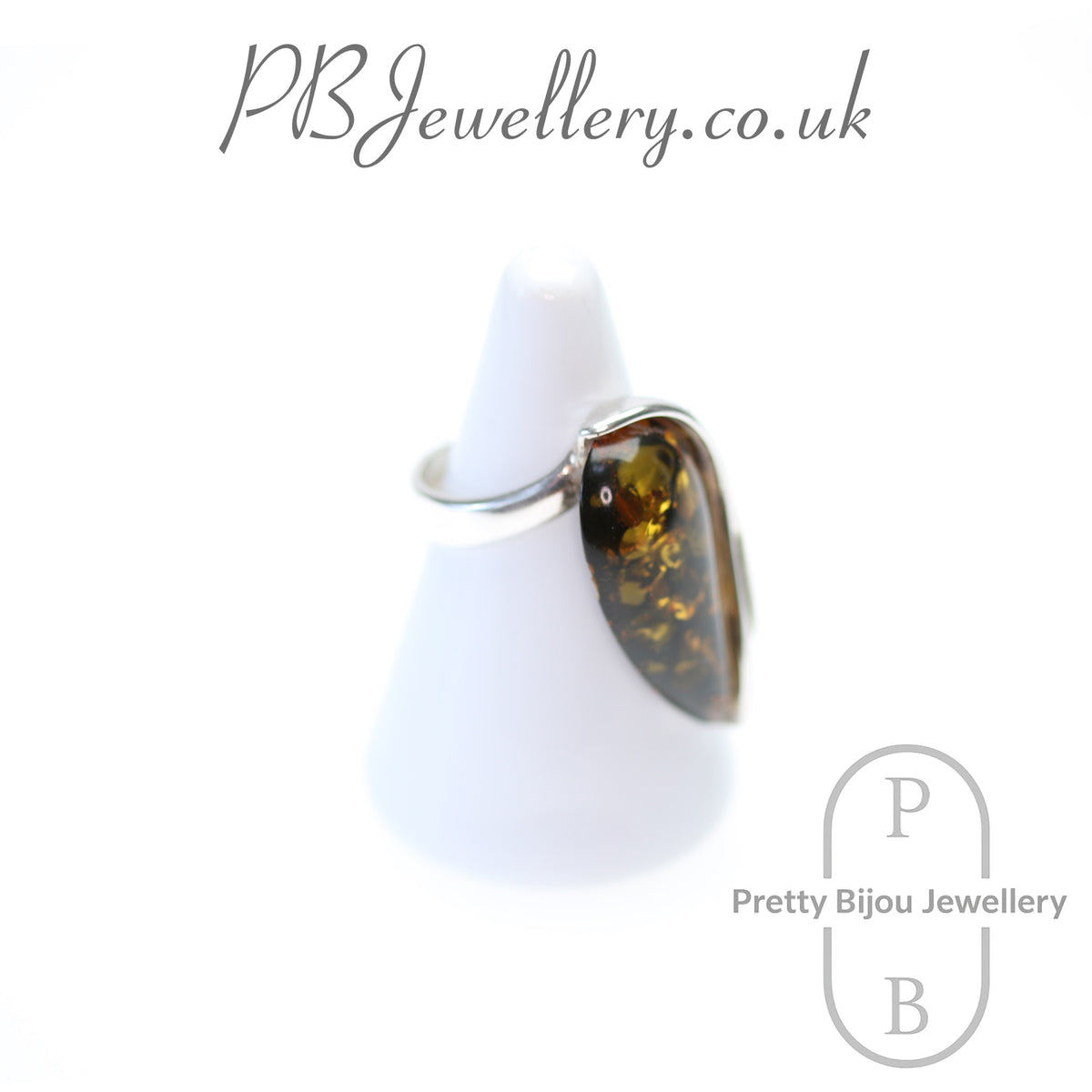 Teardrop amber sterling silver ring with flower setting, size Q – view 3