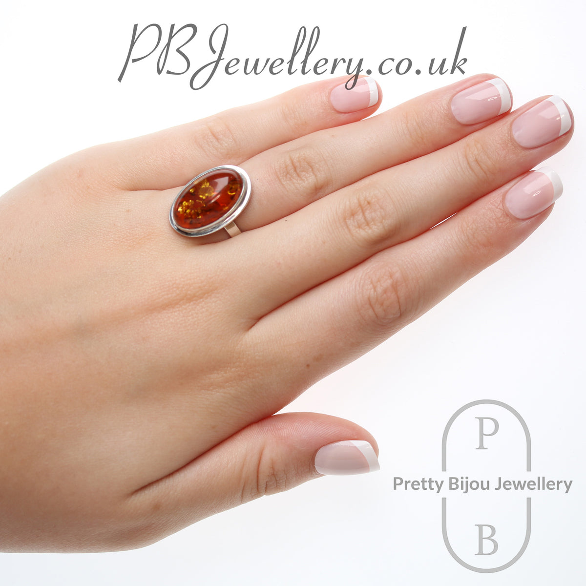 Oval amber cabochon sterling silver ring, size P – view 4