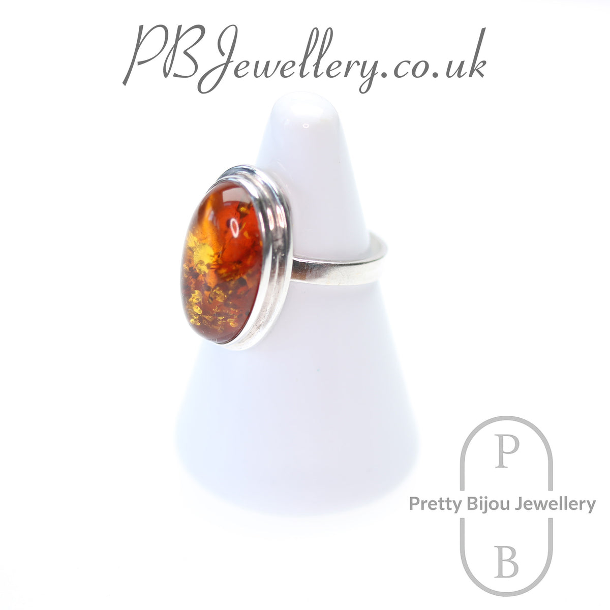 Oval amber cabochon sterling silver ring, size P – view 2