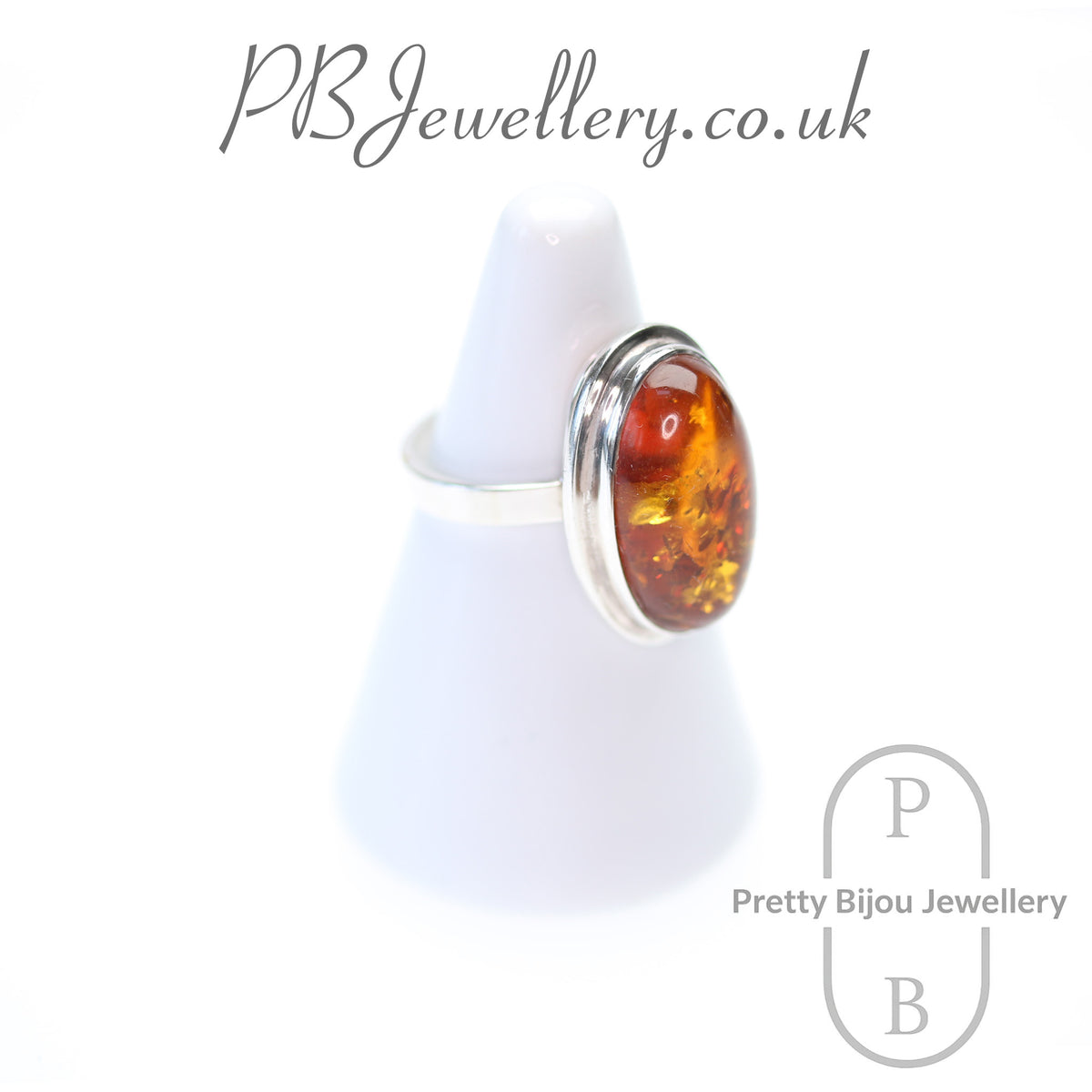 Oval amber cabochon sterling silver ring, size P – view 3