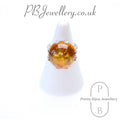 Round amber cabochon sterling silver ring, size N – view 1